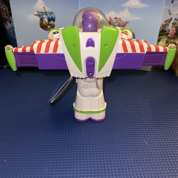 DISNEY PARKS EXCLUSIVE BUZZ LIGHTYEAR SPACE RANGER TALKING LIGHT UP SPINNER - Picture 8 of 9